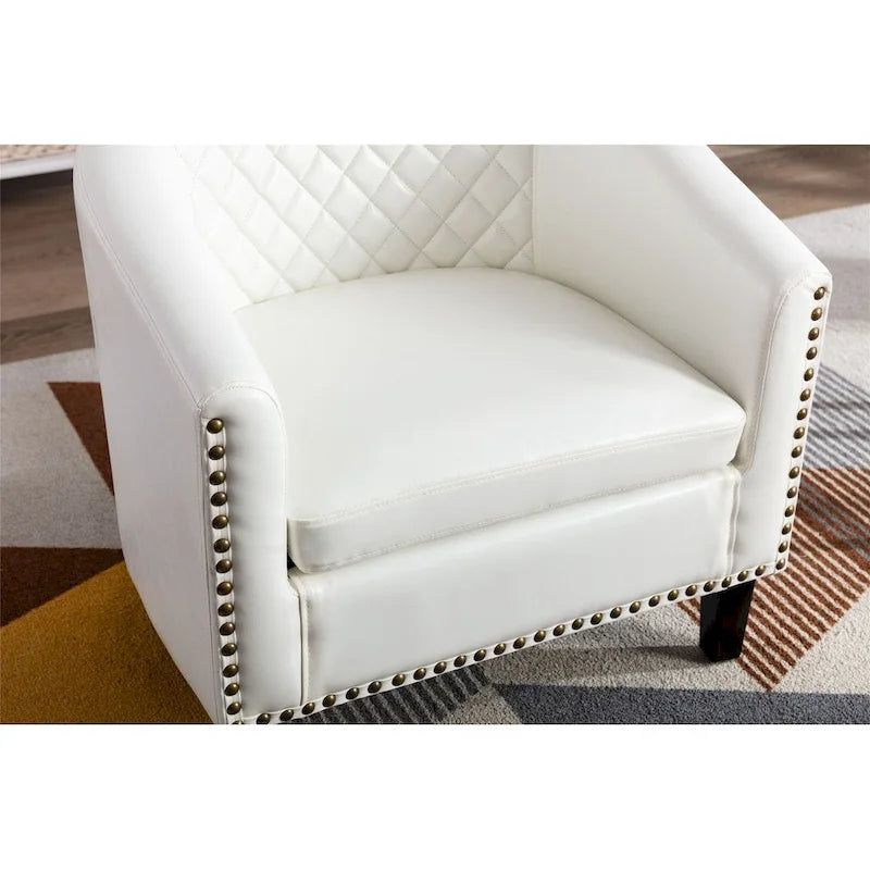 Poltrona a barilotto Accent, sedia da salotto con borchie e gambe in legno massiccio